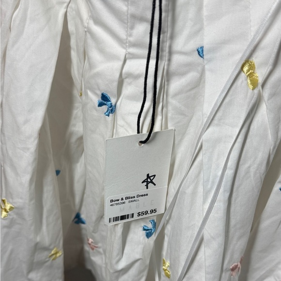 Chic White Backless Dress with Spaghetti Straps - Picture 9 of 13